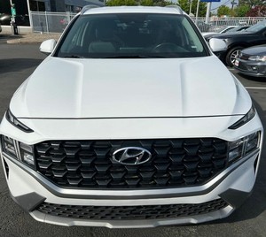 Blanco 2024 Hyunda-i Santa Fe SEL AWD con asientos de cuero Sistema de navegación Arranque remoto Techo solar Android Auto Llantas de aleación - Product Image 1