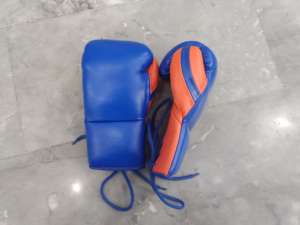 Mejor precio Fabricante profesional Guantes de boxeo de estilo mexicano Cordones de crin de cuero de vaca Guantes de repuesto de luchadores especiales - Product Image 6