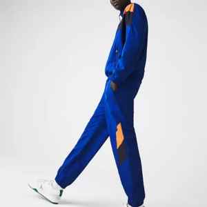 High Quality Customized 100% Polyester <b>Men's</b> <b>Tracksuit</b> Four Zipper Pocket Personalized Logo Embroidery Printing Heat Pres - Product Image 3