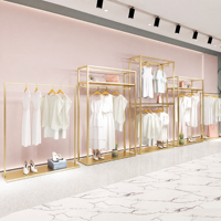 Porte-vêtements de luxe en acier inoxydable doré de haute qualité, support de présentation pour boutique avec base en MDF imitation marbre