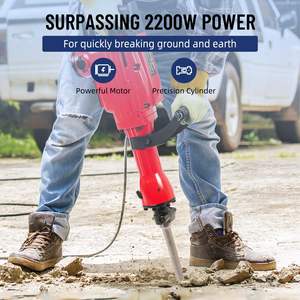 Marteau-piqueur électrique industriel et DIY robuste 1700 BPM pour le brisage du béton avec burins et mèches de dégrossissage, alimenté par batterie et livré avec mallette - Product Image 1