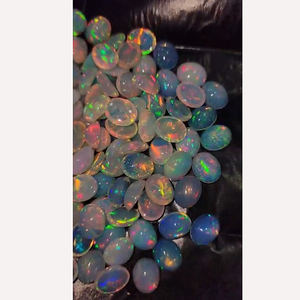 โอปอลเอธิโอเปียธรรมชาติ 105 ชิ้น ขนาด 10x8 มม. รูปไข่ แบบคาโบชอง 165 กะรัต คุณภาพ Iroc Sales หินพลอยหลวม ราคา 231 ดอลลาร์สหรัฐฯ สำหรับทั้งหมด - Product Image 3