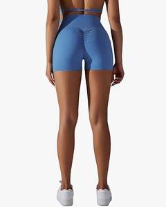 Pantalones cortos de Yoga de calidad superior para mujer, cintura cruzada, gimnasio activo, 100% poliéster, yoga elástico con bolsillos laterales - Product Image 4