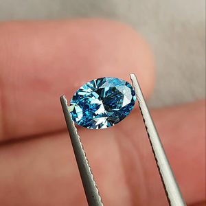 Diamante cultivado en laboratorio de 1 quilate, corte ovalado, color azul intenso, para la fabricación de anillos, certificado por IGI, proveedor de diamantes sueltos de lujo a bajo precio. - Product Image 1