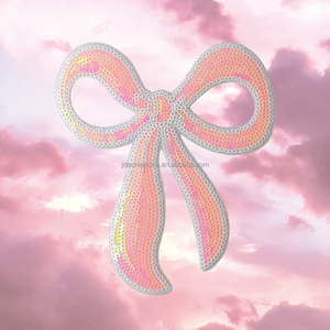 Patch brodé thermocollant en PVC rose avec nœud et sequins pour la décoration de mode - Product Image 1