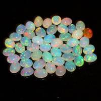 Vente en gros de cabochons ovales en opale éthiopienne blanche naturelle Welo Fire Opal Pierres précieuses en vrac pour la fabrication de bijoux pendentifs Approvisionnement en vrac