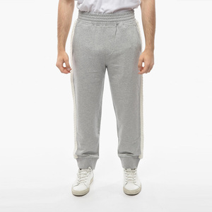 กางเกงวอร์มขายาวสำหรับผู้ชายผ้าคอตตอน100% กางเกงวอร์มทรงหลวมกันลมเอวสูงซักสีเข้มดีไซน์ตามต้องการ - Product Image 1