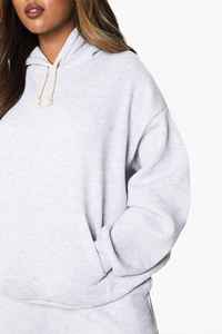 Conjunto de pantalones de chándal de pierna ancha de dos piezas de invierno con capucha para mujer de alta calidad de lana personalizada en blanco Regular Fit Short Top Pullover - Product Image 4