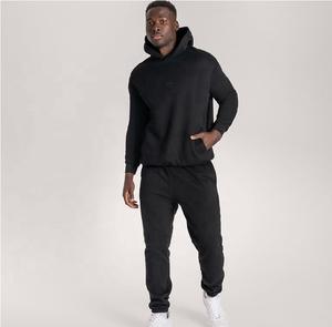 Conjunto de chándal de 2 piezas de algodón personalizado OEM para hombre, ropa de entrenamiento para correr en el gimnasio con pantalones de chándal para uso deportivo o informal - Product Image 4