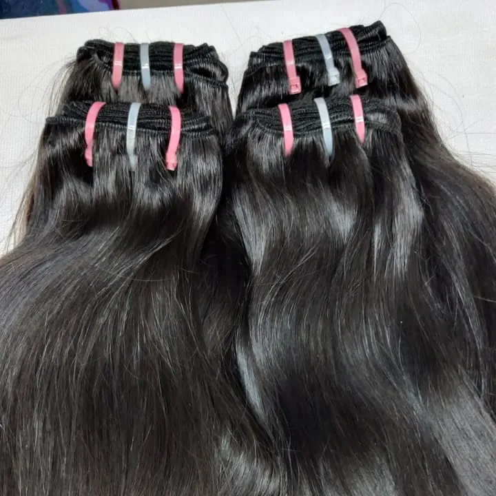 インドのジェリーヘア輸出業者によるヘアエクステンション用の100% ナチュラルウェーブマシン横糸ヘア