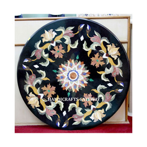 La obra de arte con incrustaciones más gloriosa y precio muy genuino de mesas con incrustaciones de mármol negro hechas a mano de forma redonda con decoración de comedor - Product Image 1