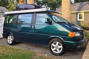 VOLKSWAGEN EUROVAN MV WEEKENDER 2003 D'OCCASION CÔTÉ GAUCHE/DROIT - Product Image 2