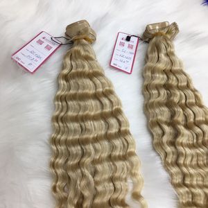 Producto popular Extensiones de cabello Remy de 8-30 pulgadas Sin enredos Sin derramamiento Cinta ondulada profunda Doble dibujado Estilo de onda natural Hecho de cabello humano - Product Image 1