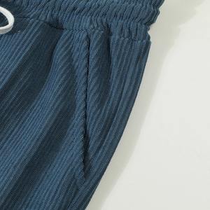 กางเกงขายาวผู้ชายทรงตรงสไตล์คาร์โก้ เอวยางยืด มีหลายกระเป๋า เหมาะสำหรับฤดูใบไม้ร่วงและฤดูหนาว สวมใส่สบาย ใช้งานได้หลากหลาย - Product Image 3