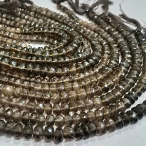 ลูกปัดควอตซ์สีน้ำตาลขุ่นขนาด8-9มม. สีน้ำตาลขายต่อเส้นยาว8นิ้ว - Product Image 1