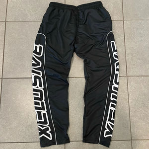 Streetwear personnalisé de haute qualité Pantalon de survêtement évasé en nylon Pantalon de survêtement à imprimé baggy pour hommes Pantalon coupe-vent réfléchissant - Product Image 2