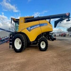 เครื่องเก็บเกี่ยวแบบรวม New Holland CX7090 มือสองคุณภาพพรีเมียม น้ำหนัก 5200 กก. เครื่องจักรที่เชื่อถือได้ ให้ผลผลิตสูงสุด ขาย - Product Image 1