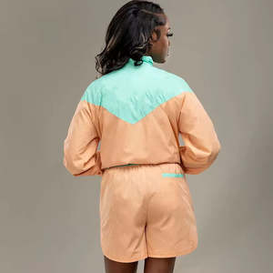 Ropa informal de moda para mujer, chándal cortavientos, chaqueta y pantalones cortos con cremallera de Color, chándal cortavientos de gran tamaño de nailon 100% para hombre - Product Image 2