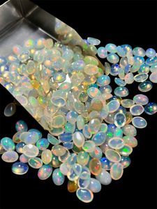 Pierres précieuses en vrac d'opale éthiopienne naturelle 7x9mm cabochons ovales diverses quantités couleur blanche 100 carats quantité minimale de commande - Product Image 5