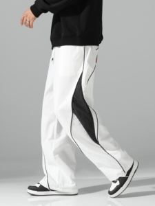 Pantalon de survêtement blanc surdimensionné pour homme, coupe large, avec empiècements latéraux contrastants noirs et détails de passepoil, taille à cordon de serrage – Vente en gros personnalisée - Product Image 5