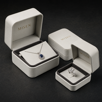 Boîte d'emballage de bijoux en cuir PU ivoire personnalisée en gros avec doublure en velours gris pour bague, pendentif, bracelet OEM