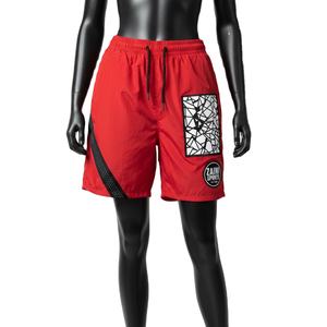 Shorts cortavientos para mujer, tela suave de poliéster tejido, secado rápido, paneles rojos y negros, logo impreso con calor. - Product Image 1