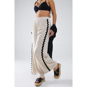 กางเกงฮาเร็มลำลองผ้าลินิน 100% สีเบจ แต่งแถบข้าง เอวกลาง ทรงขากว้าง ระบายอากาศได้ดี ขอบระบายแบบสแกลลอป ทรงยับ - Product Image 1