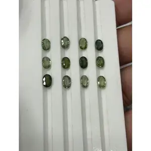 พลอยแซฟไฟร์สีเขียวธรรมชาติทรงรีเจียระไน  สำหรับทำเครื่องประดับแฮนด์เมด ขายส่งจำนวนมาก คุณภาพพรีเมียม - Product Image 1