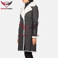 Manteau long en cuir véritable noir pour femme, style trench, double boutonnage, avec fourrure synthétique contrastante, coupe classique, vêtements d'extérieur tendance