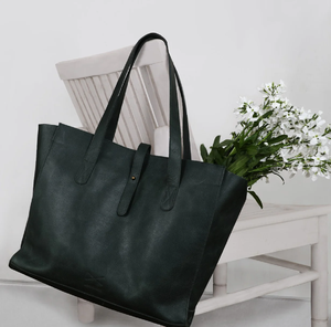 The vertical brown leather tote with a flap and marble coaster is now available at wholesale prices. - Product Image 5