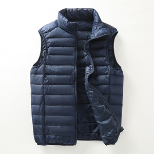 Vestes matelassées amples personnalisées OEM Manteau matelassé d'hiver en toile épaisse à col montant et logo à l'avant pour femmes pour hommes - Product Image 1