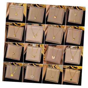 Ensemble de colliers minimalistes pour femmes en or rose, avec pendentifs en forme de cœur et de papillon, vente en gros - Product Image 1