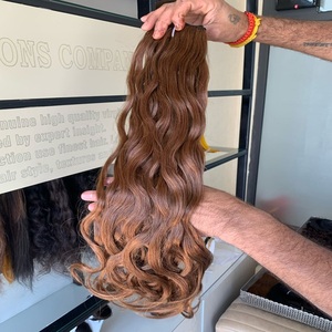 Cabello crudo indio ondulado profundo Extremos suaves y sedosos saludables Precio de fábrica al por mayor - Product Image 1