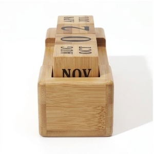 This handcrafted wooden desktop <b>calendar</b> is a reusable and eco-friendly office accessory - Product Image 3