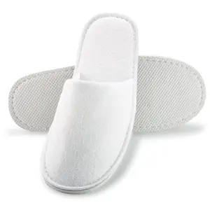 Zapatillas antideslizantes de rizo blanco con punta cerrada para hotel en 180 GSM zapatillas de hotel desechables para mujeres y hombres transpirables