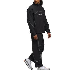 Survêtements en nylon pour hommes OEM Survêtements en nylon et polyester coupe-vent avec passepoil réfléchissant Ensemble de joggings légers personnalisés - Product Image 5