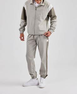 ชุดวอร์ม2ชิ้นผ้าไนลอนโพลีเอสเตอร์แบบรูดซิปขนาดใหญ่ชุดวิ่งออกกำลังกายกันลมสำหรับฤดูใบไม้ผลิออกแบบโลโก้ได้ตามต้องการ - Product Image 5