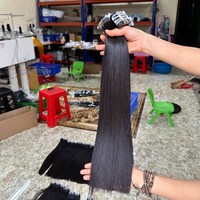 Os soyeux droit extensions de cheveux crus vietnamiens ruban aligné sur les cuticules dans les produits lisses et naturels