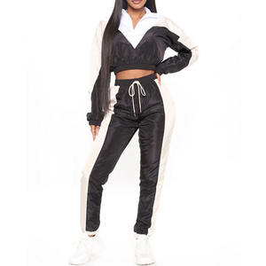 Conjunto de 2 piezas de chándal cortavientos transpirable de nailon 100% para mujer, con media cremallera, jogger corto, con capucha, talla grande, para invierno - Product Image 1