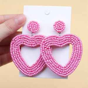 2025 recién llegados diseño duro Color Rosa Stud pendientes Unisex hecho a mano cuentas de vidrio maestro boda - Product Image 1