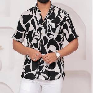 เสื้อเชิ้ตลำลองผ้าฝ้ายพิมพ์ลายใส่สบายของผู้ชาย Aloha ระบายอากาศได้สีดำและสีขาวแบบมีกระดุมปิดสำหรับฤดูร้อน - Product Image 1