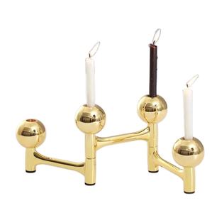 Bougeoir décoratif moderne de forme personnalisée pour la maison en laiton poli plaqué or avec 4 bougeoirs - Product Image 1