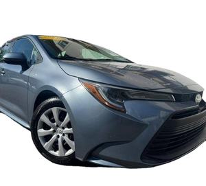 Berline automatique LE FWD 2024 d'occasion avec sièges en tissu, pneus R17, intérieur clair, en bon état - Product Image 1