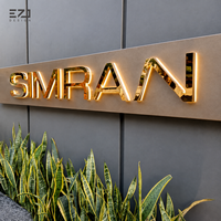 Enseigne lumineuse LED 3D personnalisée en métal doré EZD pour les entreprises, les devantures de magasins, les hôtels, les bureaux et les bâtiments commerciaux