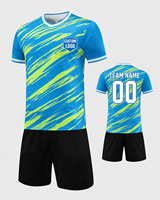 Seragam Sepak Bola Anak Grosir Bahan Polyester Bernapas Cepat Kering Pakaian Tim Kustom Seragam Tim Sepak Bola dengan Celana Pendek