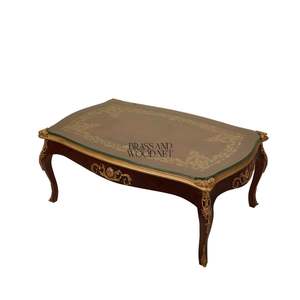 Table basse rectangulaire de luxe avec plateau en verre transparent et accents en laiton doré orné pour une décoration élégante et classique du salon - Product Image 5