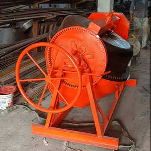 Manual industrial <b>concrete</b> mixer <b>machine</b> with gear driven wheel and steel drum used for construction material mixing in workshop - Product Image 1