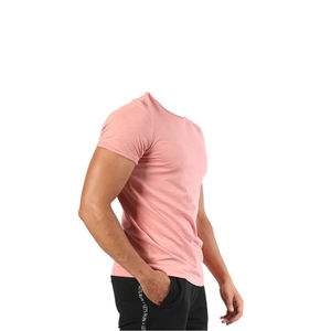 เสื้อยืดลำลองแบบเรียบง่าย ผ้าฝ้ายแท้ 100% คุณภาพสูง ผลิตตามแบบ OEM สำหรับทุกเพศ ระบายอากาศได้ดี เป็นมิตรกับสิ่งแวดล้อม แห้งเร็ว - Product Image 3