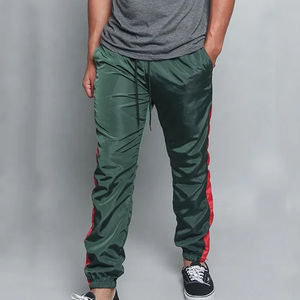 Pantalon de survêtement unisexe en nylon non tissé, coupe droite, à rayures incurvées, coupe régulière, coupe-vent, respirant, écologique, grandes tailles - Product Image 3