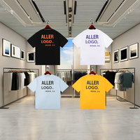 T-shirt graphique streetwear oversize 100 % coton unisexe imprimé au laser avec logo personnalisé OEM, décontracté, tricoté, respirant, tendance USA